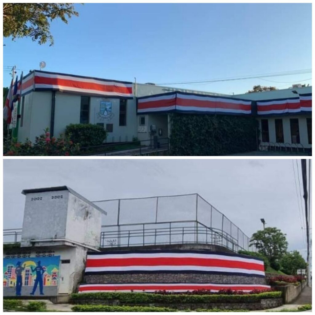 Decoración con banderas de edificios municipales en el cantón. Foto Municipalidad de Belén.